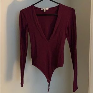 Long sleeve deep v-neck thong bodysuit